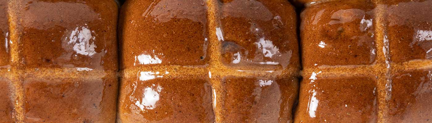 Close up image of hot cross buns